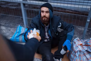 homeless services to a hungry male